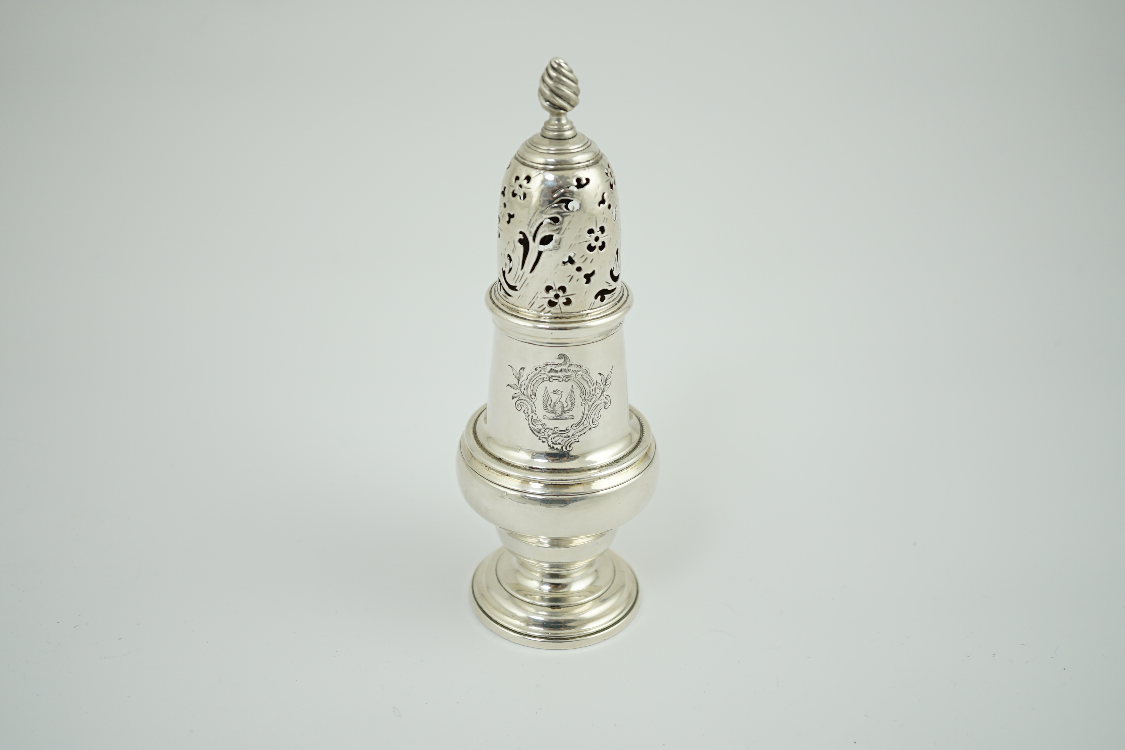 An early George III silver baluster sugar caster, by John Delmester